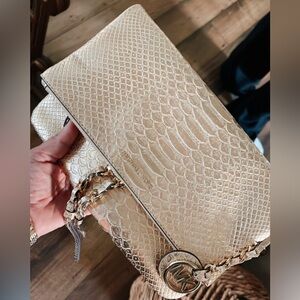 MK Gold Faux-Animal Embossed Clutch